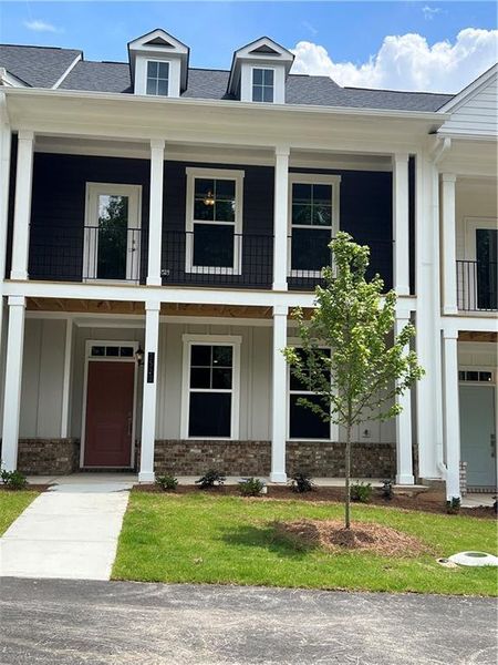 Front exterior of a new home in , Gainesville, GA, highlighting curb appeal (Image 24). Front exterior of a new home in , Gainesville, GA, highlighting curb appeal (Image 24).