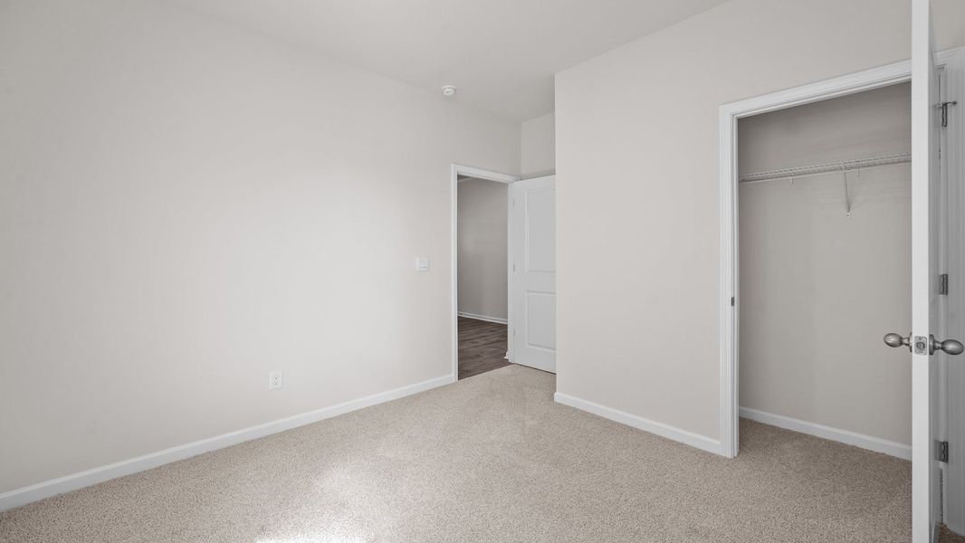 Spacious, unfurnished interior of a new home in Ridgewood Farms, Winterville (Image 19).