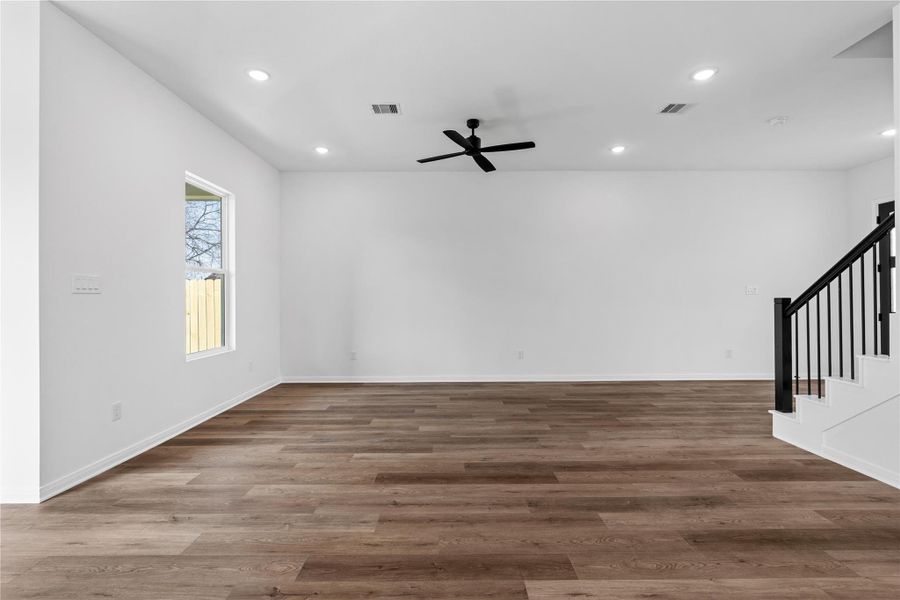 Generous living room with open-concept flow, ideal for gathering, relaxing, or setting up a flexible layout that fits your lifestyle.