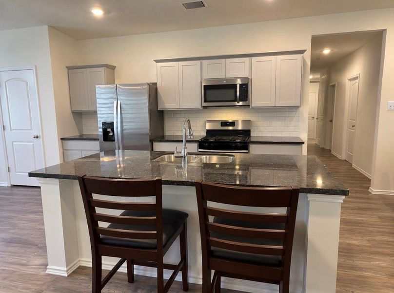 Furnished interior view inside a new home in Breckenridge Forest, Spring (Image 9).