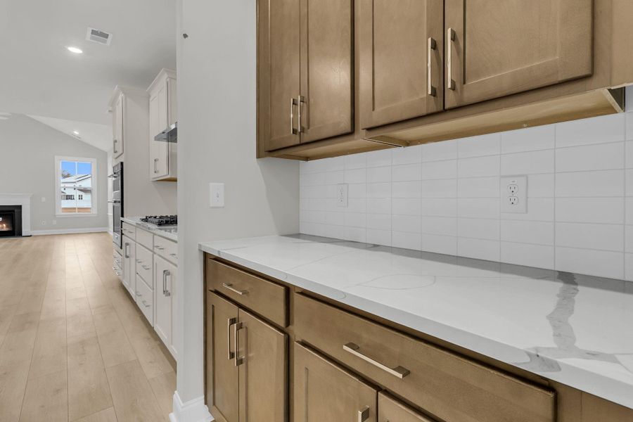 Furnished interior view inside a new home in Tidewater at Lakes of Cane Bay, Summerville (Image 12).