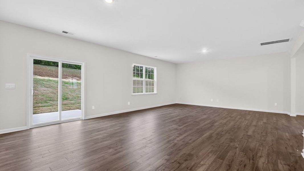 Spacious, unfurnished interior of a new home in Gretchen Pines, West End (Image 18).