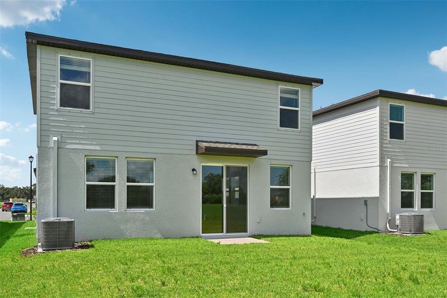 Front exterior of a new home in Salt Meadows - Premier Series, Parrish, FL, highlighting curb appeal (Image 16).