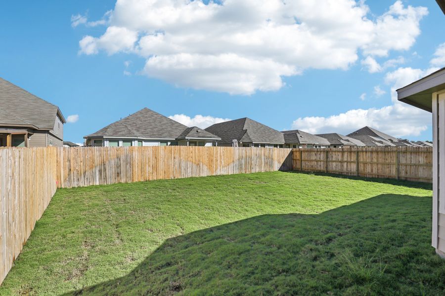 Back exterior of the Oleander floorplan at a Meritage Homes community. Back exterior of the Oleander floorplan at a Meritage Homes community.