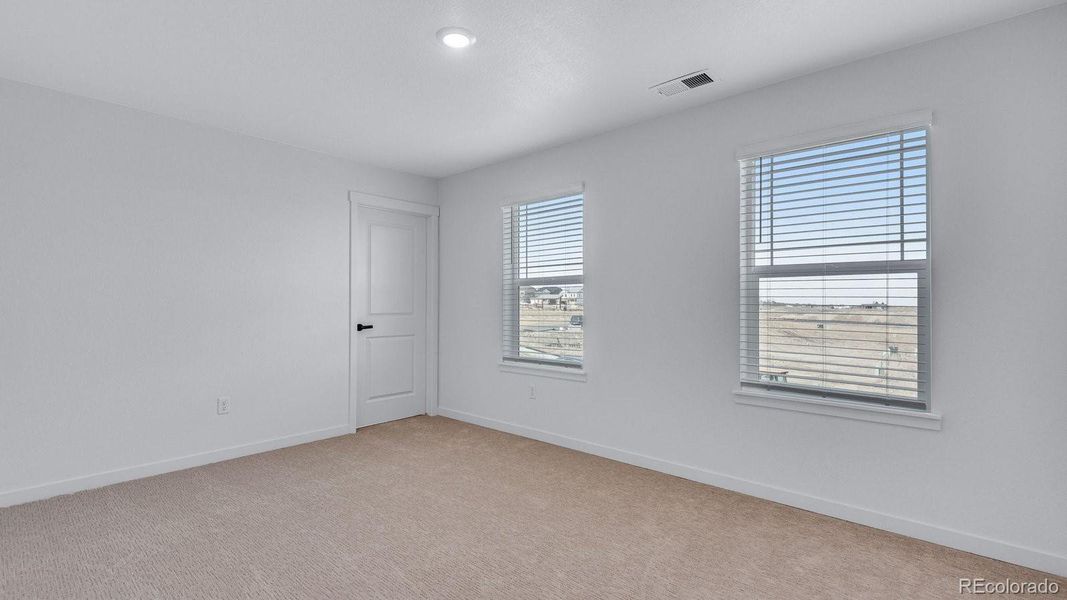 Spacious, unfurnished interior of a new home in Trails at Crowfoot, Parker (Image 33).