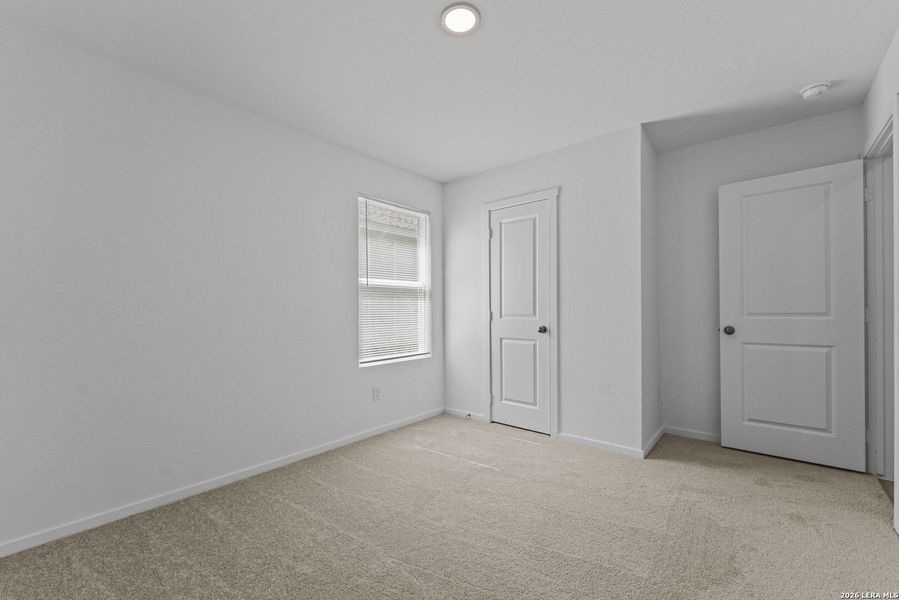 Spacious, unfurnished interior of a new home in Higdon Crossing, San Antonio (Image 25).