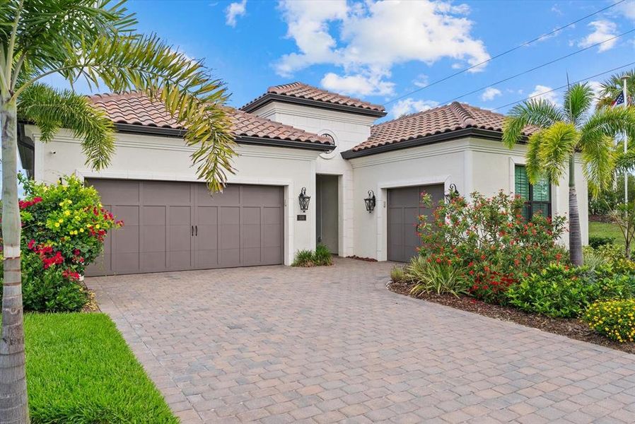 Front exterior of a new home in , Nokomis, FL, highlighting curb appeal (Image 21). Front exterior of a new home in , Nokomis, FL, highlighting curb appeal (Image 21).