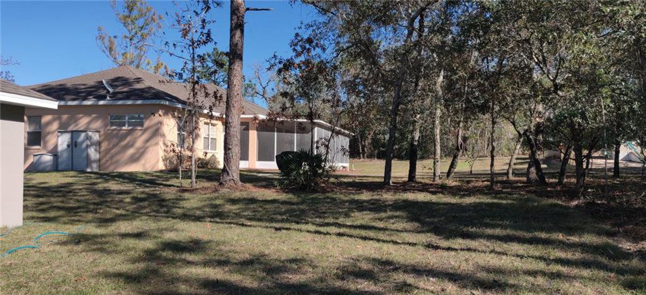Exterior details and patio area of a home in Royal Highlands, Brooksville (Image 2).