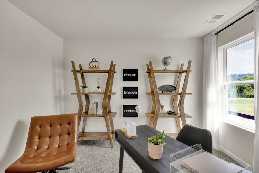 Representative furnished interior of a home built from the Darwin by D.R. Horton in Johnson Farms, Greeneville (Image 25).