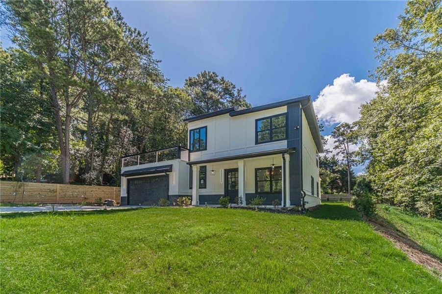 Front exterior of a new home in , Flowery Branch, GA, highlighting curb appeal (Image 27).