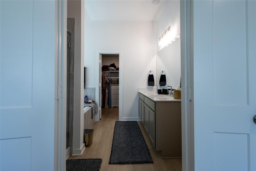 Furnished interior view inside a new home in Pinewood at Grand Texas, New Caney (Image 30).