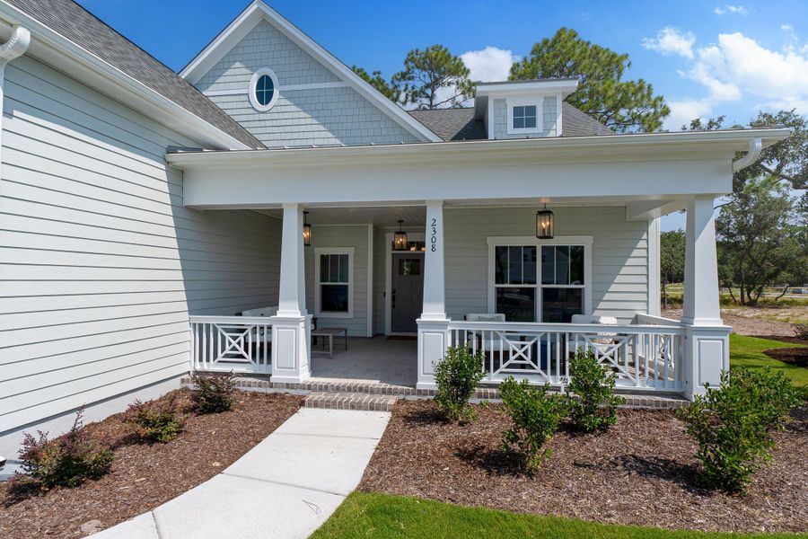Front exterior of a new home in Osprey Landing, Southport, NC, highlighting curb appeal (Image 20).