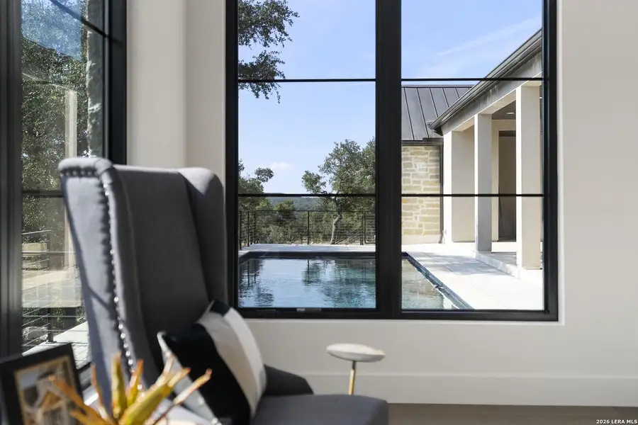 Exterior details and patio area of a home in , Spring Branch (Image 26).