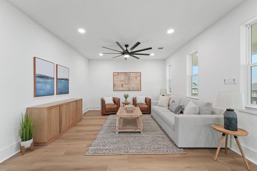 The upstairs game room or media lounge is perfect for movie nights, entertaining, or creating a cozy retreat for guests. The upstairs game room or media lounge is perfect for movie nights, entertaining, or creating a cozy retreat for guests.