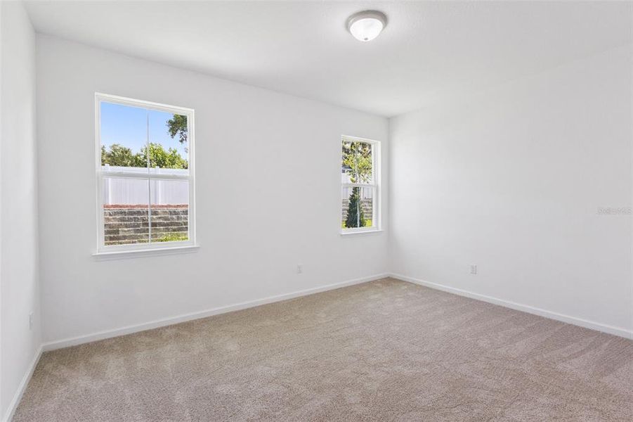 Spacious, unfurnished interior of a new home in Grand Isle, Grand Island (Image 14).
