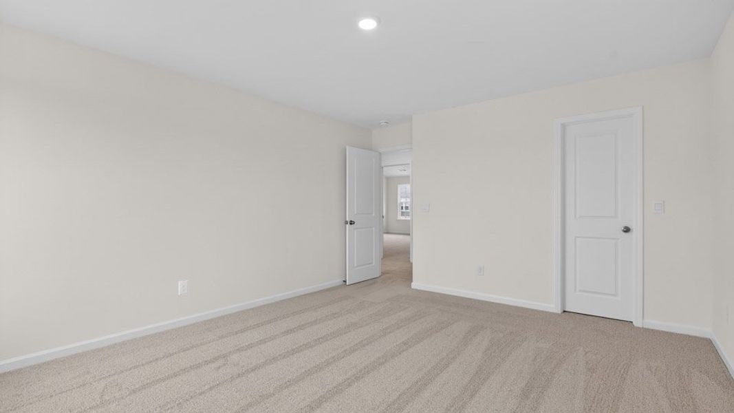 Spacious, unfurnished interior of a new home in Gretchen Pines, West End (Image 18). Spacious, unfurnished interior of a new home in Gretchen Pines, West End (Image 18).