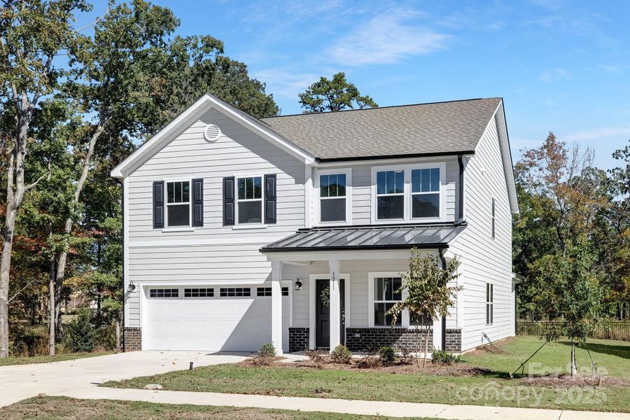 Front exterior of a new home in , Monroe, NC, highlighting curb appeal (Image 1). Front exterior of a new home in , Monroe, NC, highlighting curb appeal (Image 1).