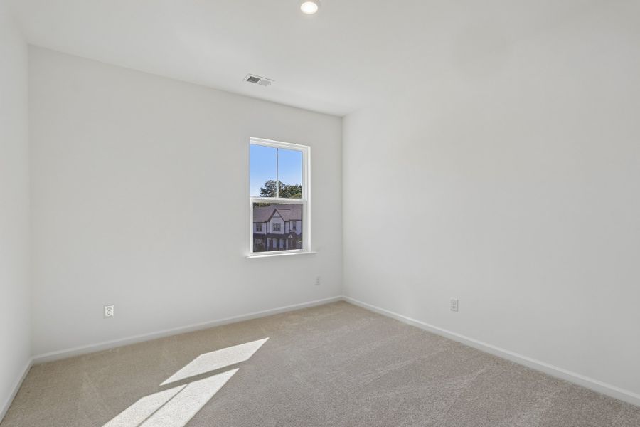 Spacious, unfurnished interior of a new home in Terraces at the Exchange, Fort Mill (Image 26).