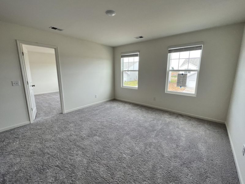 Spacious, unfurnished interior of a new home in Crossing at Givhans, Ridgeville (Image 5).