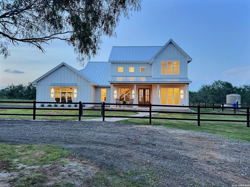 Front exterior of a new home in , Jourdanton, TX, highlighting curb appeal (Image 19).