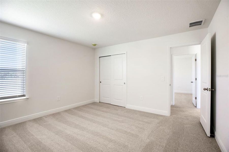 Spacious, unfurnished interior of a new home in The Reserve at Hammock Oaks - Classic Series, Lady Lake (Image 39).