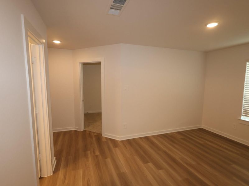 Spacious, unfurnished interior of a new home in Pinewood at Grand Texas, New Caney (Image 28).