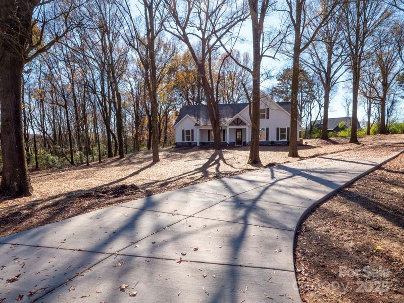 Front exterior of a new home in , Monroe, NC, highlighting curb appeal (Image 2). Front exterior of a new home in , Monroe, NC, highlighting curb appeal (Image 2).
