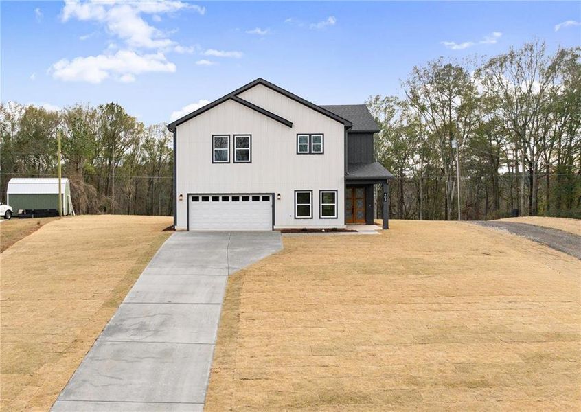 Front exterior of a new home in , Jefferson, GA, highlighting curb appeal (Image 18).