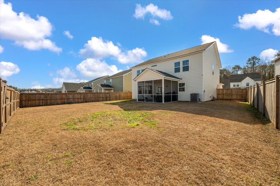 Exterior details and patio area of a home in Sweetgrass at Summers Corner, Summerville (Image 31).