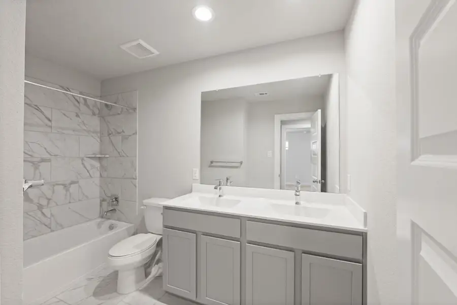 Furnished interior view inside a new home in Cypresswood Landing, Humble (Image 4).