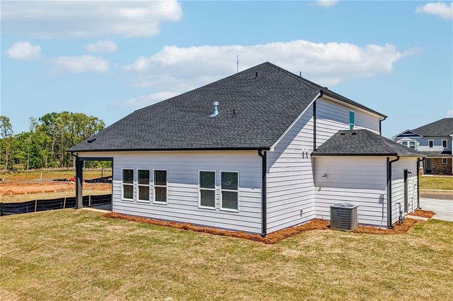Exterior details and patio area of a home in River Pointe, Monroe (Image 24).
