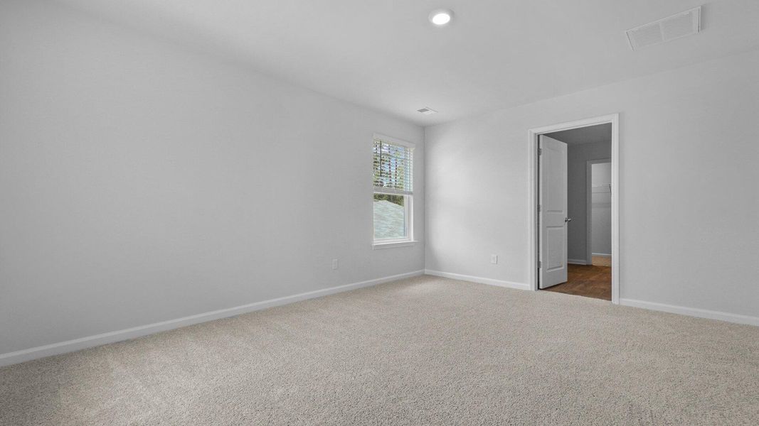 Spacious, unfurnished interior of a new home in Pine Hills at Cane Bay, Summerville (Image 14).
