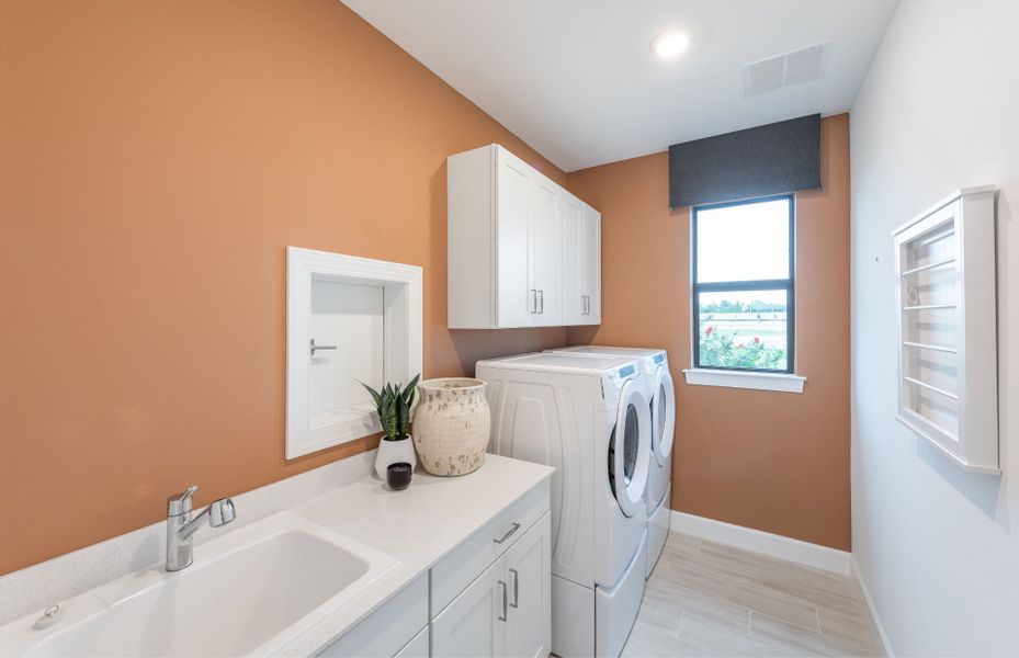 Utility room with appliances and added storage