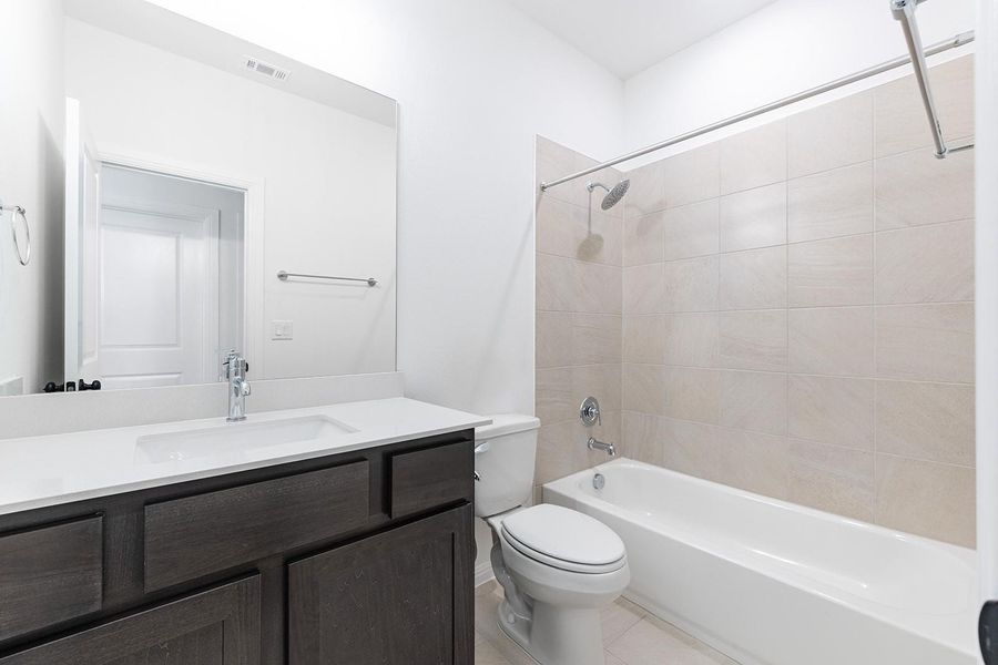 Furnished interior view inside a new home in Parmer Ranch 60, Georgetown (Image 6).