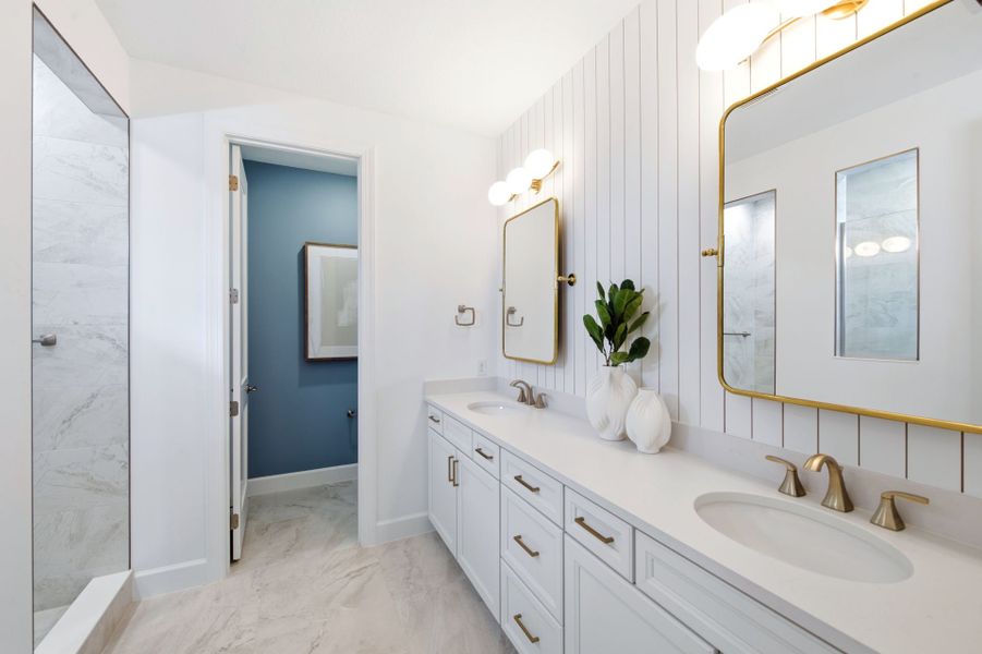 Representative furnished interior of a home built from the Scarlett by DiVosta in The Reserve at Eastpointe, Palm Beach Gardens (Image 25).