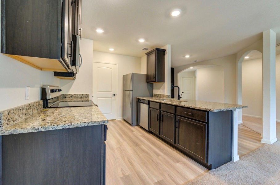 Furnished interior view inside a new home in Williams Trace, Magnolia (Image 13).