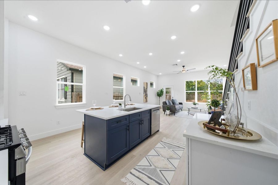 The large island will sit 3 comfortably and provides ample prep space.