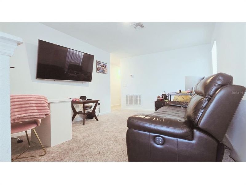 Furnished interior view inside a new home in Cascades, Davenport (Image 16).