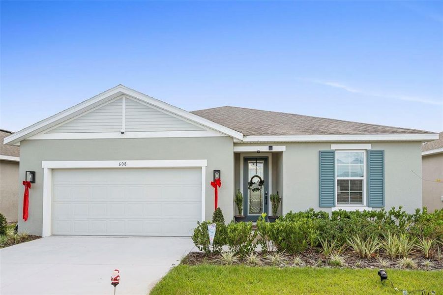 Front exterior of a new home in , Lake Wales, FL, highlighting curb appeal (Image 25). Front exterior of a new home in , Lake Wales, FL, highlighting curb appeal (Image 25).
