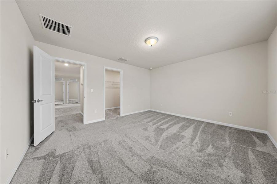 Spacious, unfurnished interior of a new home in EverBe, Orlando (Image 31).