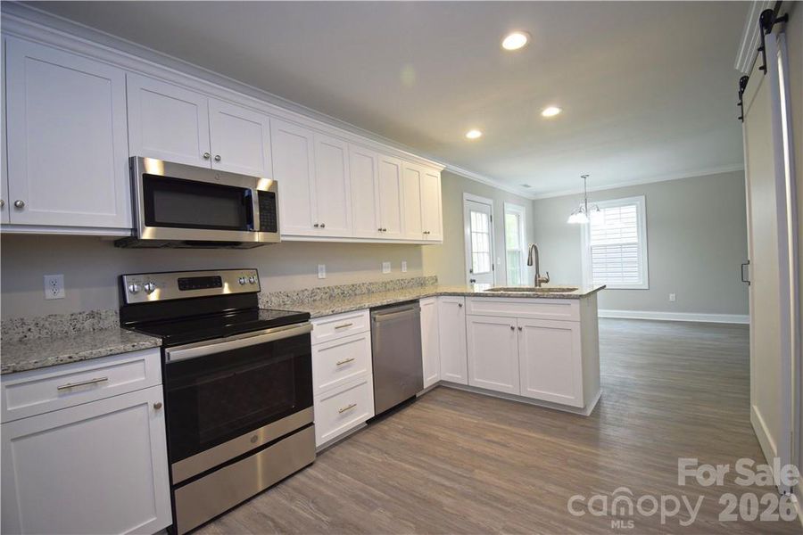 Furnished interior view inside a new home in , Hickory (Image 8).