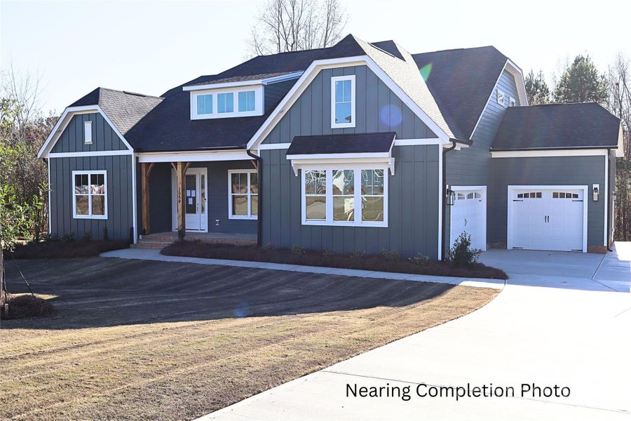 Front exterior of a new home in Shepherds Trace, Clover, SC, highlighting curb appeal (Image 2).