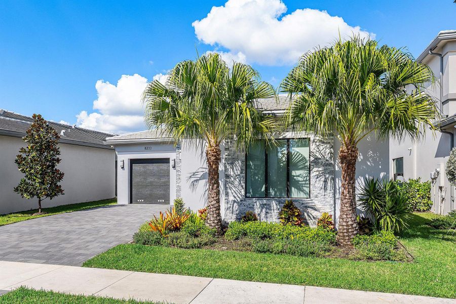 Front exterior of a new home in , Boca Raton, FL, highlighting curb appeal (Image 2). Front exterior of a new home in , Boca Raton, FL, highlighting curb appeal (Image 2).