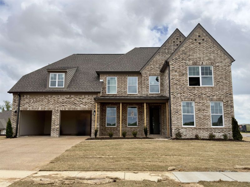 Front exterior of a new home in White Oak, Arlington, TN, highlighting curb appeal (Image 1). Front exterior of a new home in White Oak, Arlington, TN, highlighting curb appeal (Image 1).