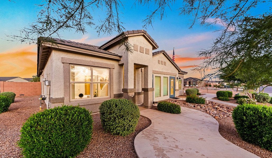 Front exterior of a new home in Barnett Village, Marana, AZ, highlighting curb appeal (Image 24).