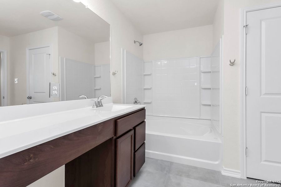 Furnished interior view inside a new home in Spanish Trails Villas, San Antonio (Image 6).