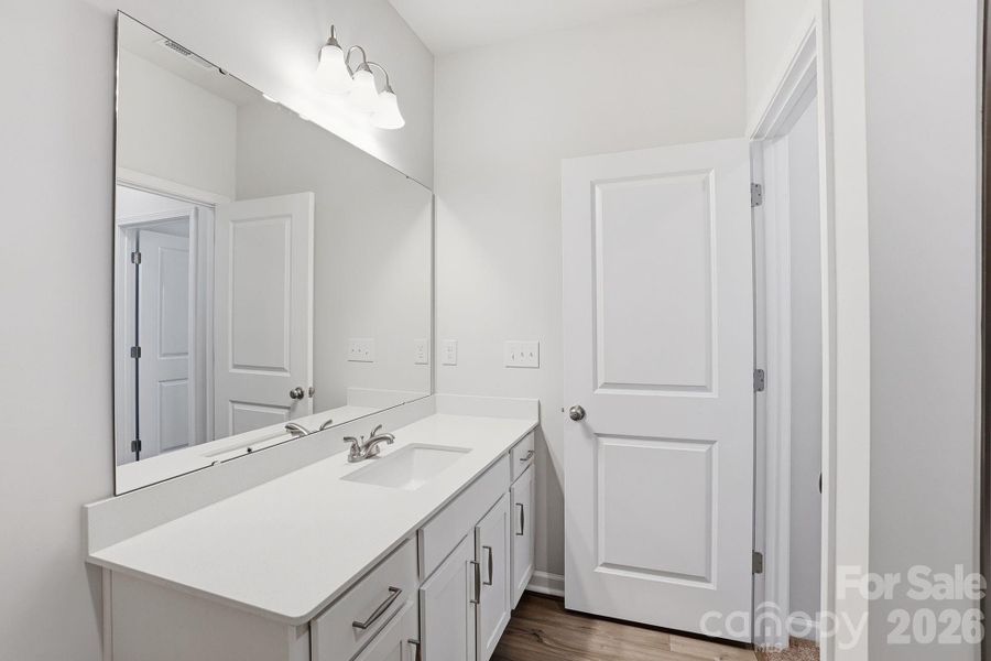 Furnished interior view inside a new home in Sloan Station, Charlotte (Image 9).