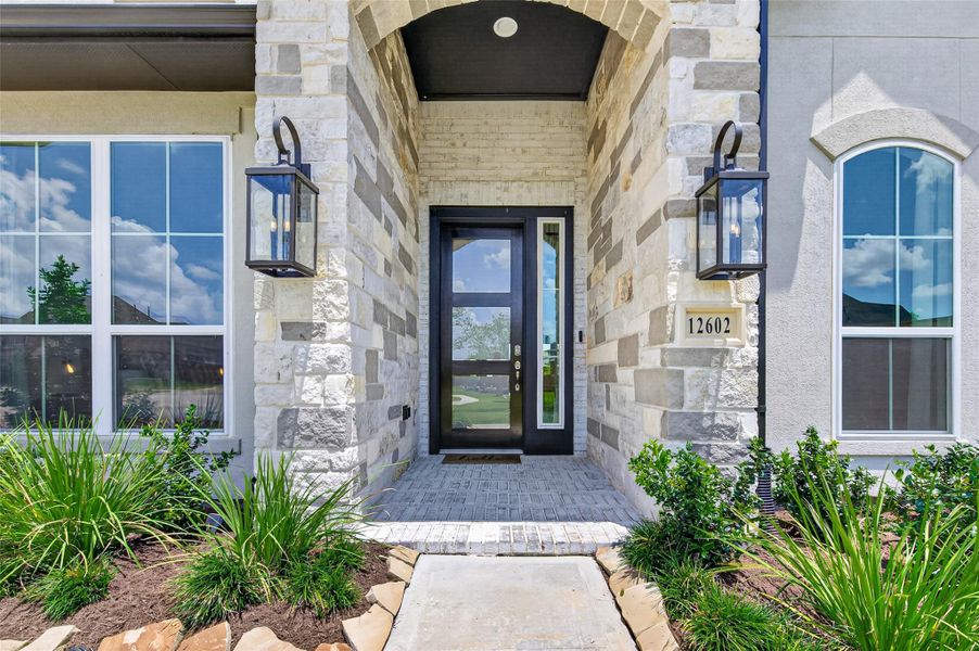 Exterior details and patio area of a home in Towne Lake 70’, Cypress (Image 3). Exterior details and patio area of a home in Towne Lake 70’, Cypress (Image 3).