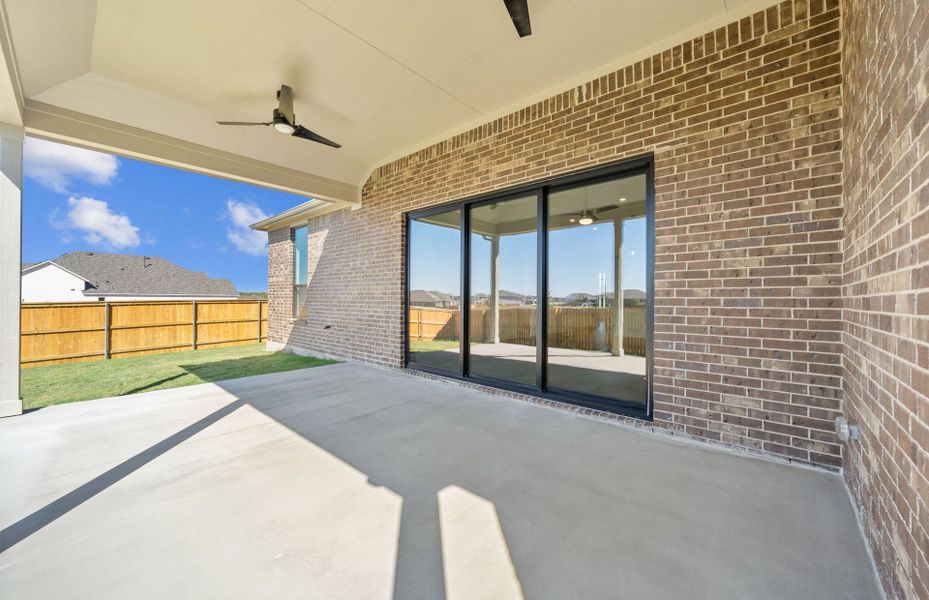Exterior details and patio area of a home in 6 Creeks, Kyle (Image 23).