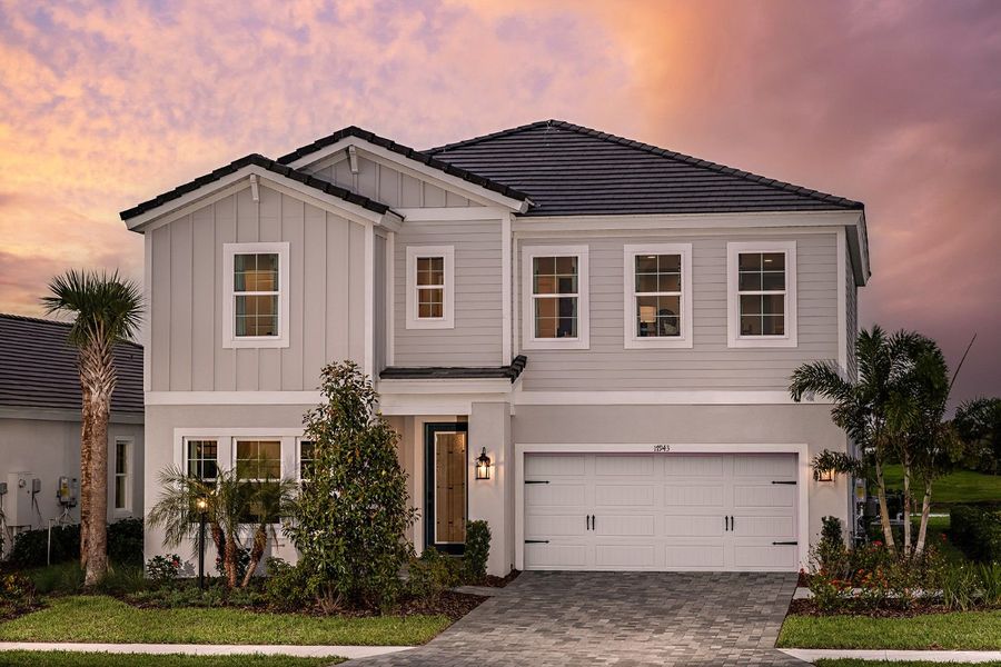 Representative exterior photo of a completed home built from the Pelican by Homes by WestBay in Star Farms at Lakewood Ranch, Lakewood Ranch, FL (Image 1).
